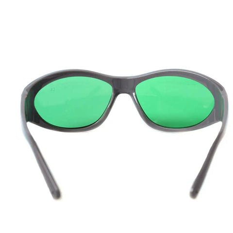 Laser Safety Eye Protection Gear For 635Nm To 660Nm And 808Nm To 830Nm Plus 900Nm To 1100Nm Beams, green lenses in sturdy black frames.