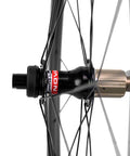 Close-up of rear hub and spokes, Dope Carbon Road Bike Disc Brake Wheelset With 55mm Clincher Tubeless Ready Rim 25mm Width UD Matte Finish