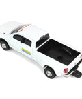 Top view of New Holland Ram 3500 Big Horn Dealership Diecast Pickup Truck 1 By 64 Scale with chrome grille and black bed liner.