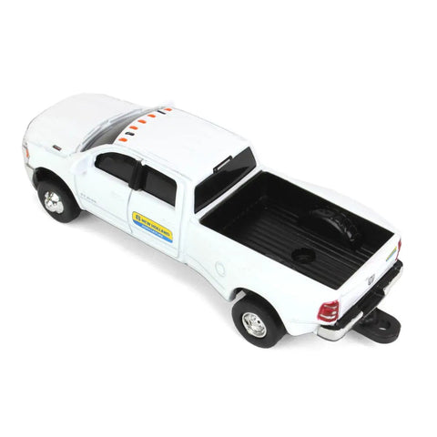 Top view of New Holland Ram 3500 Big Horn Dealership Diecast Pickup Truck 1 By 64 Scale with chrome grille and black bed liner.