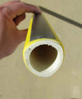 Close-up of yellow fiberglass handle from 10 Tines Forged Seed Fork With Fiberglass Handle For Rugged Heavy Duty Farm And Garden Use One Piece Tines And Head Weather Resistant Ensilage Fork Made In USA