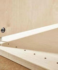 Close-up of Heavy Hitter DOMINO Corner Connection Assembly Kit for Furniture building, showing durable corner pins in wood.