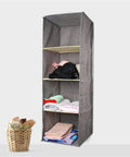 Kick Up Your Closet Game With This Slick Hanging Wardrobe Organizer Featuring A Spacious Mezzanine Drawer And Multi Pocket Portable Rack In Beige. Portable hanging organizer with fabric shelves displaying folded clothes.