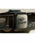 Toyota Hitch Receiver Tube Plug OEM PT22835960HP Genuine Cover installed on vehicle 2-inch receiver