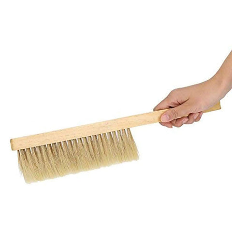 Hand holding Two Pack Beekeeping Bee Brushes With Long Sixteen Point One Inch Wooden Handles And Natural Horsehair Bristles Soft Hive