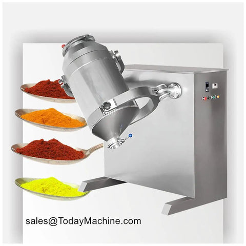 Industrial mixer machine blending colorful spices with stainless steel container