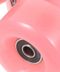 Close-up of pink semi jelly PU wheels, part of 4 Pack Roller Skate Wheels With Bearings Double Row Outdoor Quad Skating Wheels Replacement Parts.