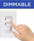 Hand adjusting dimmable light switch with 'DIMMABLE' text above, indicating adjustable lighting control.