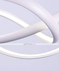 Close-up of Dope Modern Chic LED Ring Chandelier Ceiling Pendant Light with dimmable remote, showcasing irregular twisted ring design.