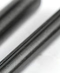 Close-up of black oxide finish spring steel pin from Slotted Spring Dowel Pin Assortment Kit 450 Pieces With Plastic Storage Case For Automotive