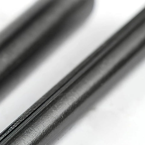 Close-up of black oxide finish spring steel pin from Slotted Spring Dowel Pin Assortment Kit 450 Pieces With Plastic Storage Case For Automotive