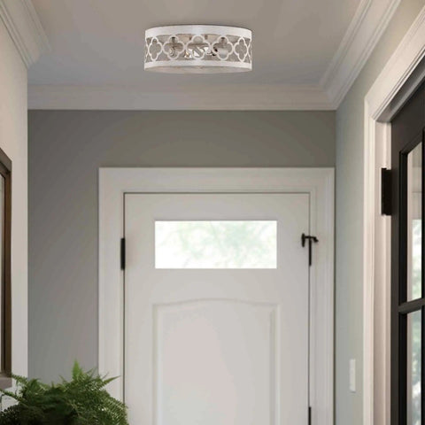 Farmhouse Quatrefoil 13 Inch Flush Mount Ceiling Light With Distressed White Metal Drum Shade And Antique White Finish, 2 Light Fixture For Living Room And Hallway, Modern Rustic Vibe in a hallway setting