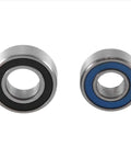 Close-up of two chrome steel 30Pcs Sealed Bearing Kit For 1 14 RC Hauler Grand Knight Upgrades with dual rubber seals.