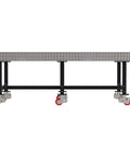 Heavy Duty Mobile Welding Fixture Table With Precision Hole Grid And Smooth Swivel Casters Solid Steel Fabrication Workbench 96 By 48 Inches side view with red caster wheels.