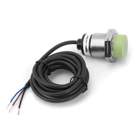Inductive Proximity Sensor Switch With 15mm Detection Range NPN Normally Open Output Plated Brass Body, shown with connection wires.