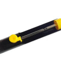 Close-up of Pro Grade Desoldering Pump Vacuum Solder Sucker Tool with black aluminum body, showing yellow plunger and nozzle.