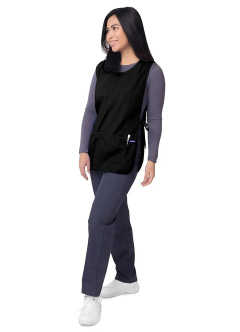 Model wearing Unisex Cobbler Apron Set in Black 2 Pack, 27.5 inch length, with deep front pockets, perfect for crafting and cooking.