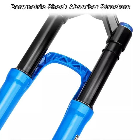 Beefed Up Front Fork For Mountain Bikes With Damping And Disc Brake Compatibility, close-up showing barometric shock absorber, blue accents