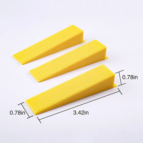 Yellow wedges from Pro Grade Tile Leveling System Kit With 600 White Spacers And 200 Red Wedges Plus Pliers For One Eighth Inch Stone