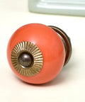 50 Pack Orange Round Ceramic Drawer Knobs For Kitchen Cabinets And Dressers Rust Free Smooth Corners Super Easy Install Pretty Damn Durable Top Shelf Kitchen Door Pulls close-up view with brass detail and smooth finish.