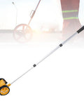 Glaeptio Dual 4in Rolling Measuring Wheel Accurate Distance Tool 0 to featuring a yellow wheel and aluminum handle for easy distance measurement.