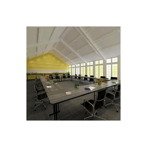 Spacious meeting room with No Fuss Adjustable Flip Top Standing Desk Built Tough For Quick Workspace Swaps Locking Casters.