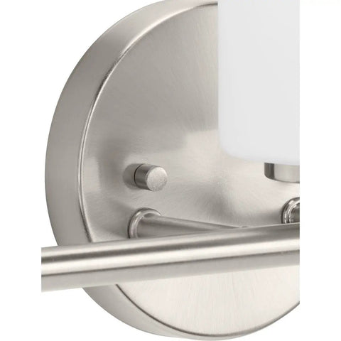Detail of brushed nickel finish on Four Light Etched White Glass Modern Bathroom Vanity Light Replay Collection For Coastal Contemporary Baths