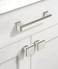 Set Of Five Premium Brushed Satin Nickel Kitchen Cabinet Knobs For Drawers And Pantries Top Shelf Hardware on white cabinetry.