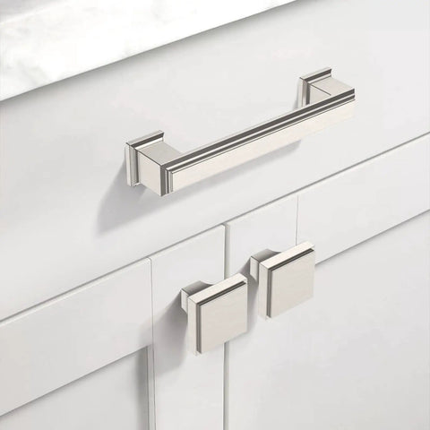 Set Of Five Premium Brushed Satin Nickel Kitchen Cabinet Knobs For Drawers And Pantries Top Shelf Hardware on white cabinetry.