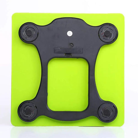 Slim Smart Body Fat Scale With Smartphone App For Nail Your Fitness Goals Elegant Black Bathroom Weight Monitor bottom view with black edges on green