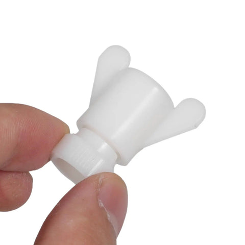 Close-up of white plastic nut from Plastic Nuts And Long Bolts Hardware Kit For Greenhouse Vent Windows Repair in hand