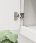 One Pair Half Inch Overlay Self Closing Compact Concealed Cabinet Hinge With Face Frame Mounting on white cabinet door.