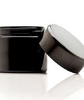 Top Tier Tall Black Glass Storage Vessel With Ultraviolet Filtering Glass To Block Harmful Rays While Providing Lock Tight Seals.