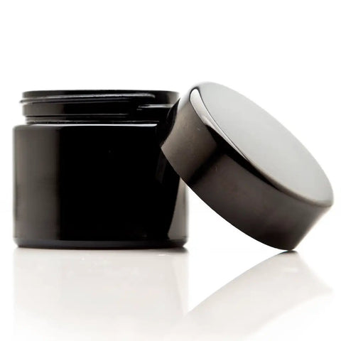 Top Tier Tall Black Glass Storage Vessel With Ultraviolet Filtering Glass To Block Harmful Rays While Providing Lock Tight Seals.