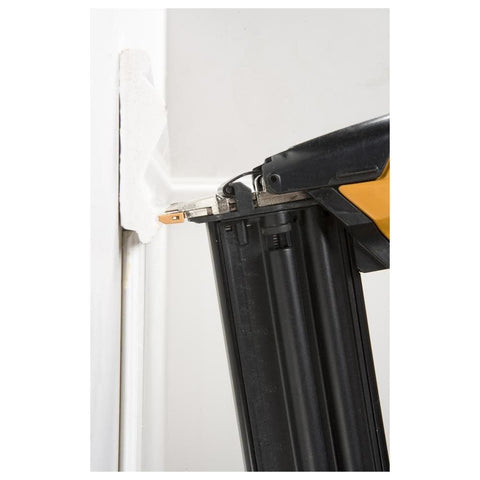 Close-up of Brad Nailer Kit with Smart Point Technology, 18 Gauge Pneumatic Nailer Delivers 5/8 to 2-1/8 Inch Nails in use on trim