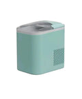 Countertop Ice Maker With Plug And Play Setup That Chills Drinks Fast Self Cleaning Mechanism Delivers Two Sizes Of Bullet Ice In Minutes, compact teal design.
