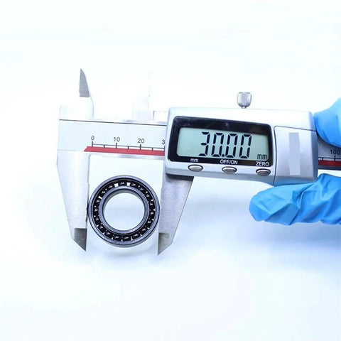 Close-up of Rock Solid 2Pc High Temp Thin Section Bearings 6903 measuring 30mm diameter for industrial use.