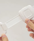 Heavy Duty No Drill Furniture Anchors For Baby Proofing with upgraded adhesive straps in hand for easy installation.