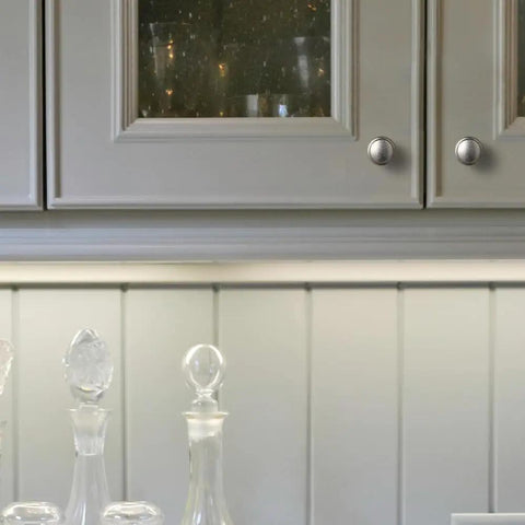 Cabinet with Antique Silver Round Cabinet Knobs Six Pack, Vintage Furniture Handles, Smooth Classic Round Design