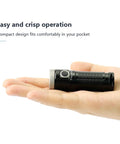 T1 Magnetic Tailcap EDC Flashlight USB Rechargeable Stepless Dimming shown in hand for size scale
