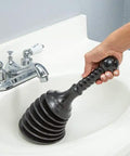Heavy Duty Sink And Drain Plunger For Kitchen And Bathroom Sinks Showers And Bathtubs With A Beefy Four Cup Bellows For Double Power Compact Yet Mighty For Commercial And Residential Drains Black in use in white sink