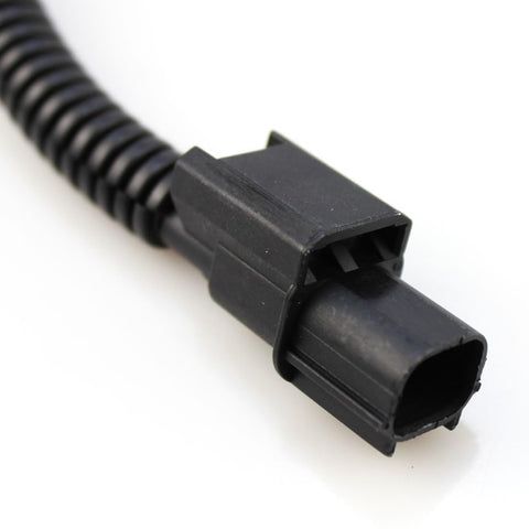 Close-up of a connector from the VCM Muzzler Harness Disable Kit For Honda 3.5L V6 Engine With VCM Fits Honda Acura Pilot Accord Odyssey Ridgeline 2 Pack Durable Connectors For Easy Plug And Play Install And Real World Performance Enhancement.