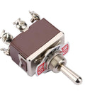 No Frills 3 Position On Off On Momentary Toggle Switch With 6 Pin Leads And 12mm Body rated at 15 Amps showcasing clear wiring terminals.
