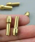 Close-up of two piece brass collet set for rotary tools fits 1.0mm 1.6mm 2.3mm and 3.2mm shanks held in hand