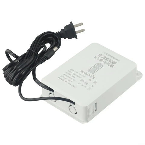 Reliable Mini Ups With 6000 Mah Battery Backup For Wifi Routers Modems And Security Cameras 12 Volt 2 Amp Power Supply shown with power cord.