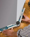 No Sweat Heavy Duty Digital Angle Finder Miter Calculator Protractor Level in use on wooden floor for accurate measurements.