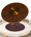 Premium Tempered Glass Lazy Susan Turntable And Slick Swivel Serving Tray showing reflective brown glass surface on aluminum base.