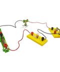 Build An Easy Electromagnet And Simple Circuit Kit with battery box, switches, wires, and lamp socket displayed on white background.