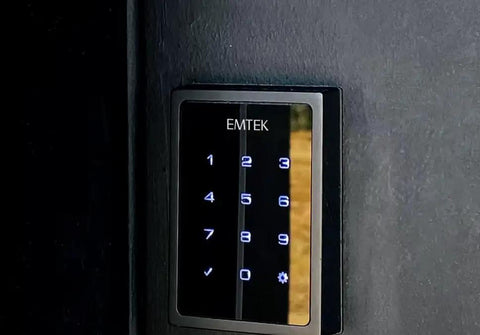 Top Shelf Biometric Fingerprint Smart Deadbolt Delivering Hella Smooth Wireless Bluetooth And Wifi Enabled Keyless Home Entry For Serious Security Boosts With Unlimited Guest Codes And Effortless Phone App Sync - close-up of EMTEK keypad with illuminated buttons.