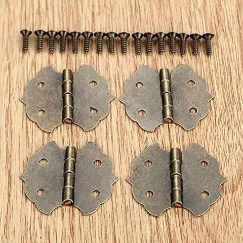 Old School Antique Bronze Vintage Flower Cabinet Door Butt Hinges For 4 Holes With Screws 29 By 31mm on wooden surface